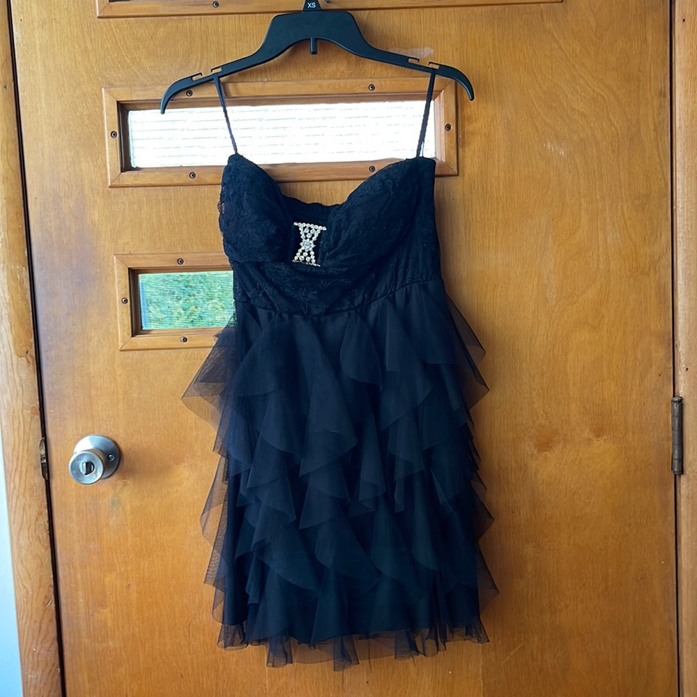 Strapless black dress with rhinestone in the center!